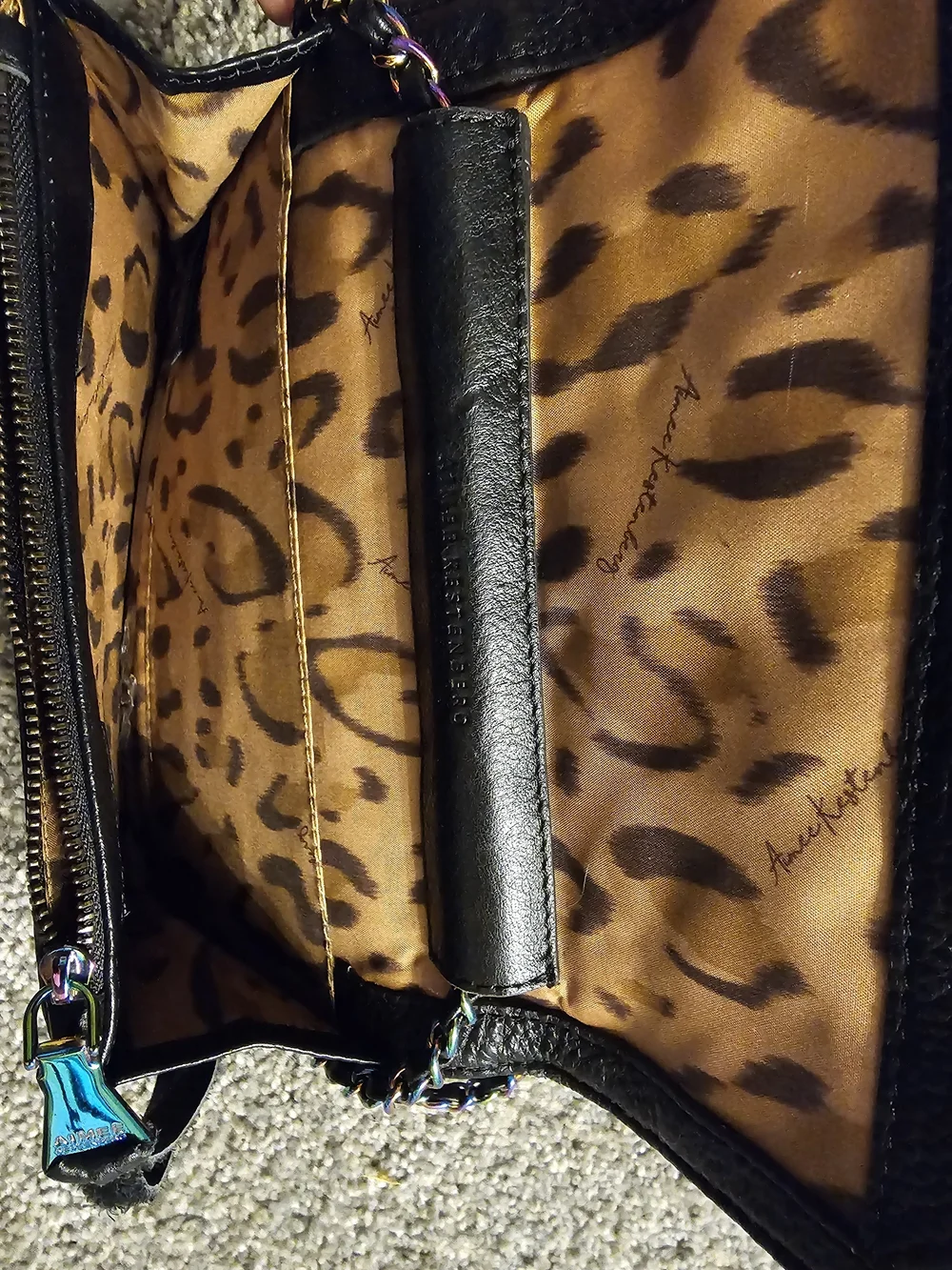 Black Quilted Leather Crossbody Bag with Iridescent Chain